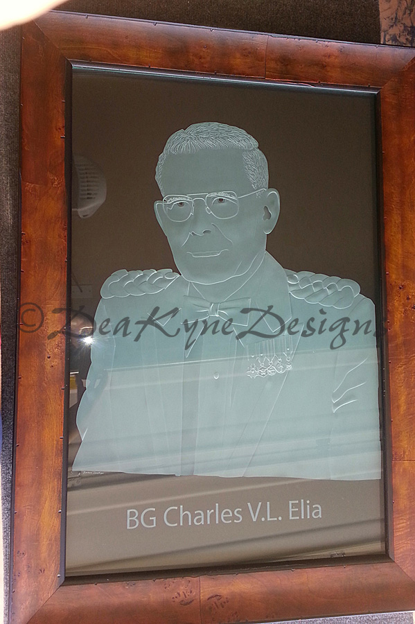 Portrait carved sculpted into laminated glass